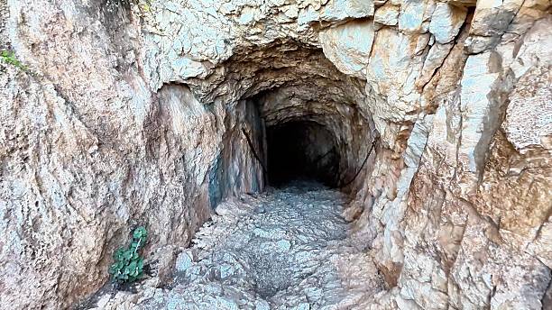 istock Embarking on a fascinating journey to explore an ancient underground tunnel filled with intrigue 2222472535