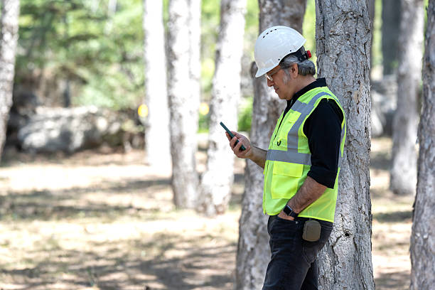 istock An engineer is thinking about the project and doing research on his mobile phone 2222474700