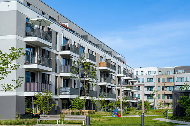 istock Modern Apartment Complex With Green Park and Comfortable Seating 2222475928