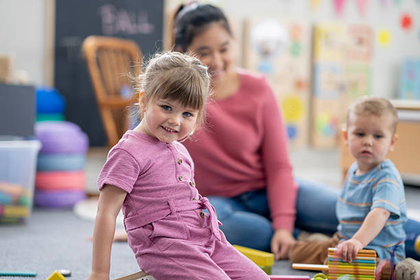 istock Happy Children Playing and Learning in a Fun Preschool Environment 2222477238