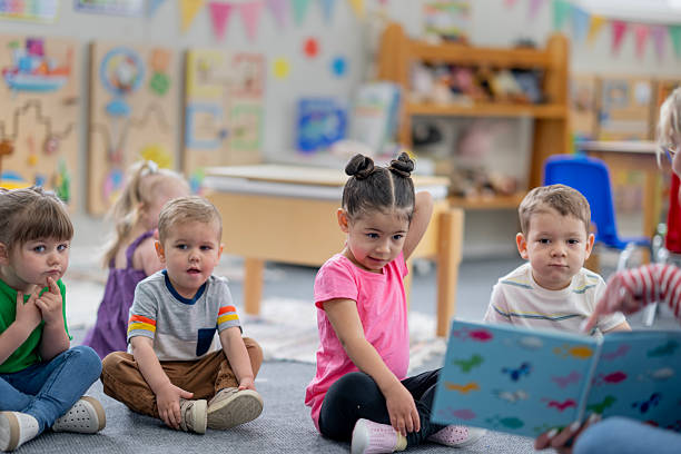 istock Preschool Kids Engaging in Storytime Activity in Bright Classroom Setting 2222477387