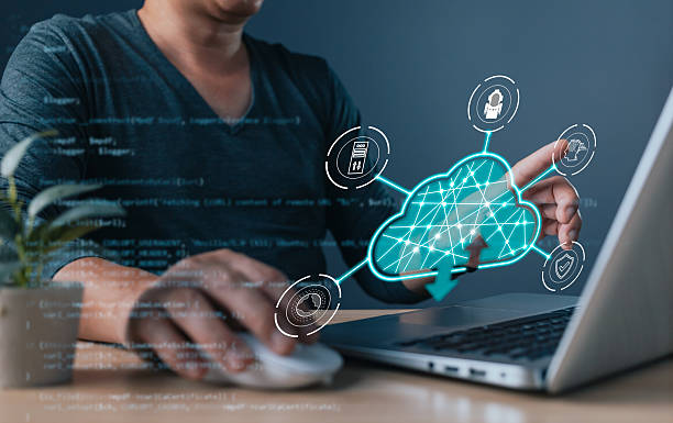 istock professional uses a laptop with a holographic cloud computing, symbol cloud technology, digital transformation, data management, cybersecurity, and system efficiency in modern tech solutions. 2222482511