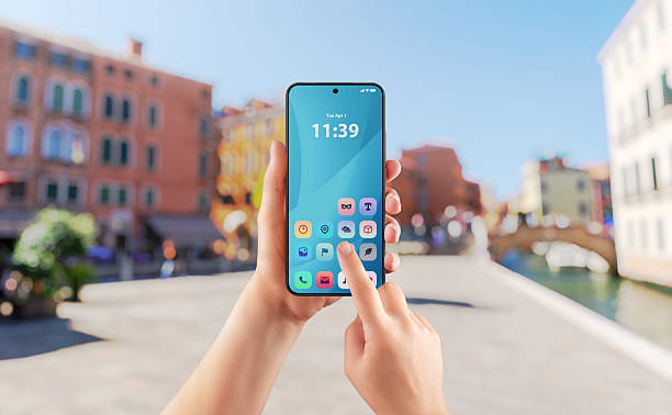 istock Smartphone app interface used outdoors on sunny day, perfect for travel, lifestyle or navigation apps 2222484480
