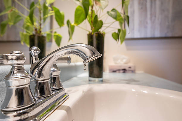 istock Dripping Faucet in a Bathroom 2222489260