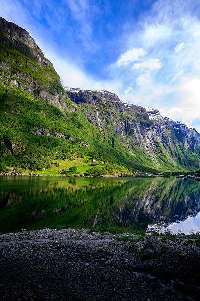 istock Mountain reflection in fjord - Norway 2222498977
