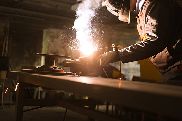 istock Manual Welding Operation in Factory Setting 2222509546