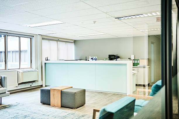 istock Empty waiting room with reception desk in modern clinic 2222510228