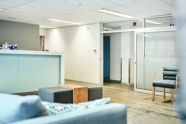istock Modern clinic lobby with empty waiting room and reception desk 2222510253