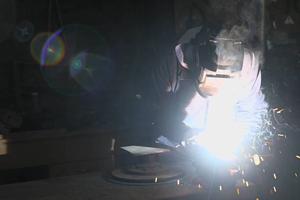 istock Industrial Welding with Bright Sparks and Smoke 2222512803