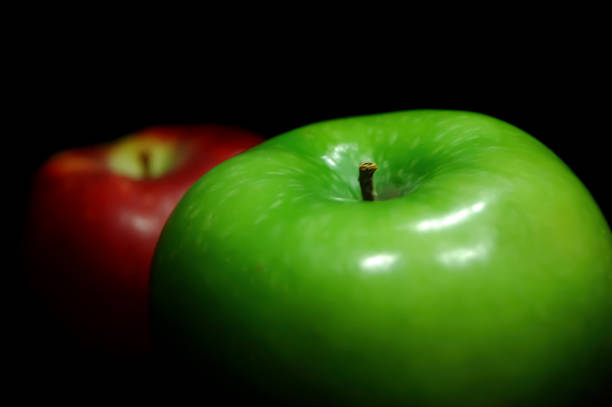 Close-Up Of Apples Against White Background