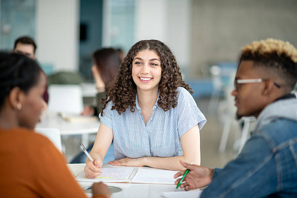 istock Group of Students Collaborating Together on a Project in a Modern Setting 2222516061