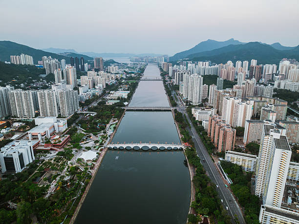 istock Shing mun river flowing through sha tin, hong kong, at dusk 2222521288