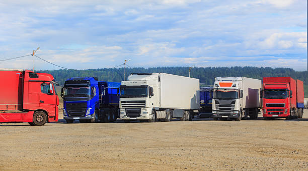 istock Large trucks parked near the highway 2222523461