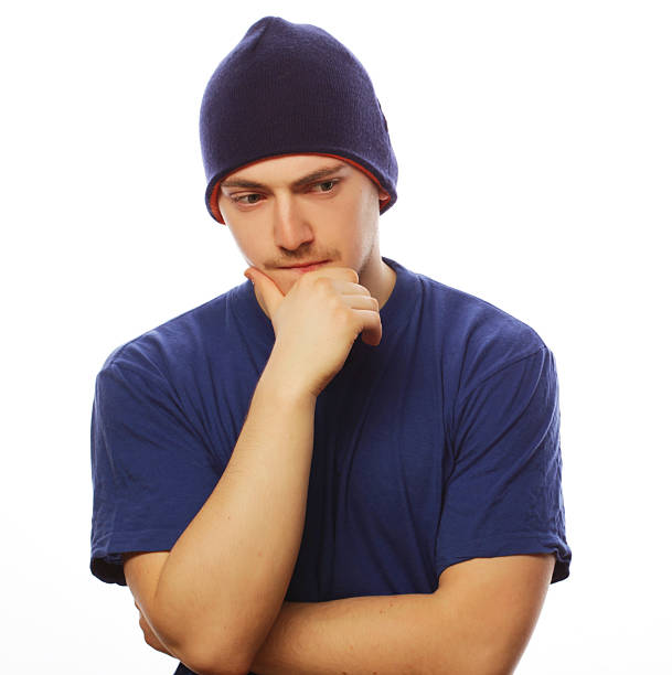 Life style, sport and people concept - young handsome man in blue t-shirt and blue hat.