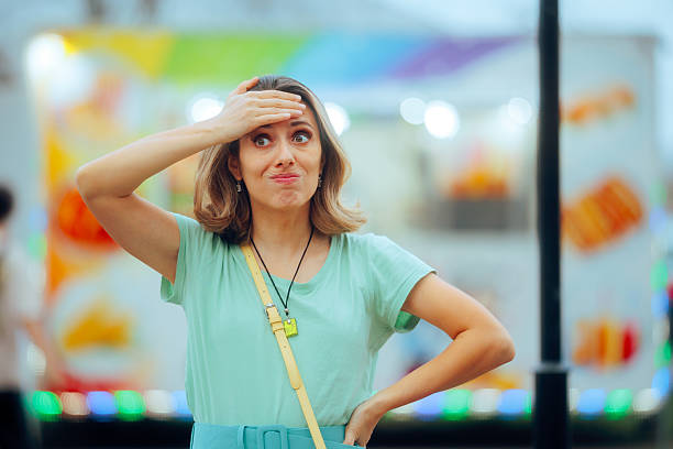 istock Woman with Hand on Forehead Forgot Something Important 2222542114