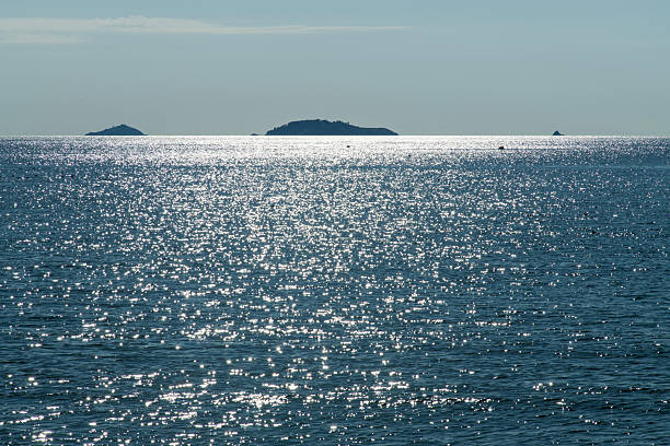 istock shiny sea and island 2222554002