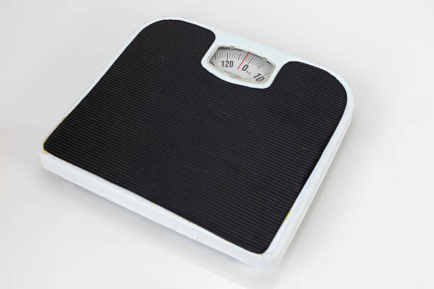 istock Analog Mechanical Bathroom Weighing Scale with Black Footpad and White Frame 2222559091