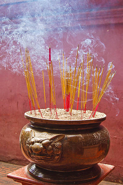istock Jar containing incense sticks in a Buddhist temple 2222560306