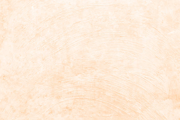 Old blank empty textured effect beige brown fawn khaki colored old weathered distraught mud wall vector background with wave or curved design full frame plaster texture wall. Apt for rural village setting mud wall backdrop decorated with handicraft design,