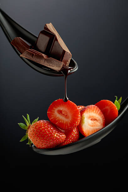 istock Fresh strawberries and melted dark chocolate. 2222569070