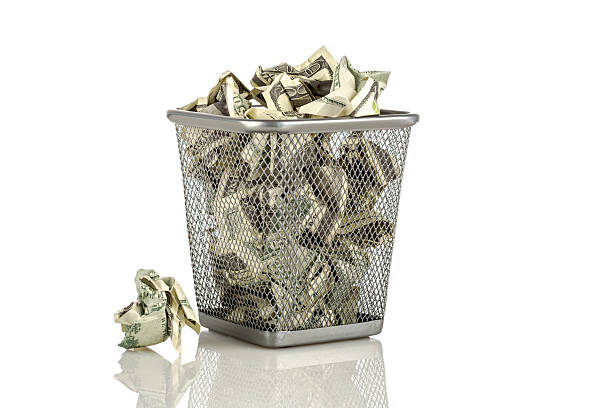 istock Money in a basket on a white background... 2222575627