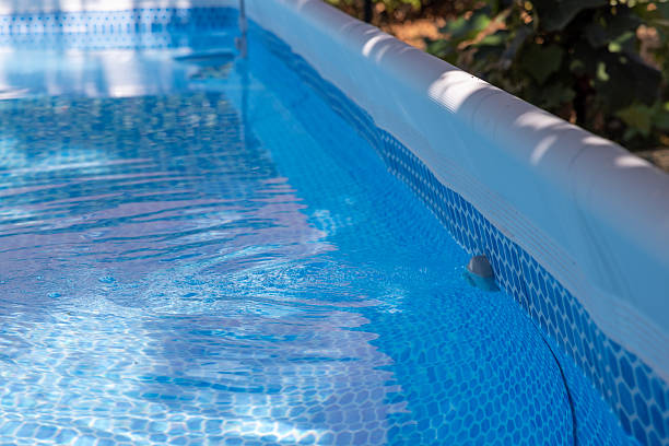 istock Above Ground Pool with Sunlit Blue Water 2222575735