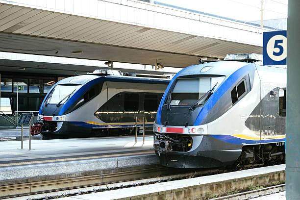 istock Modern passenger trains standing on the platforms on railroad station 2222576331