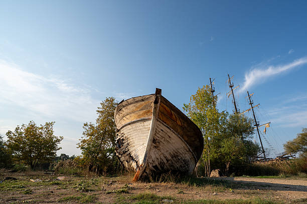 Old boats abandoned on the ground. High quality photo