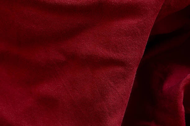 istock Red cotton fabric close up texture for background, wallpaper 2222581416