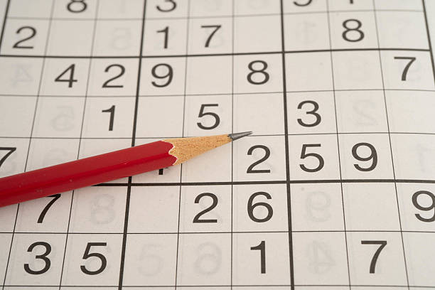 istock Sudoku puzzle, game to play for keep you brain younger for developing Alzheimer disease in senior patient. 2222583952