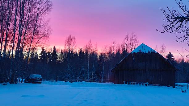 istock Purple winter sunset with barn in foreground 2222588052