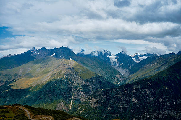 istock Mountain ranges on a sunny day at Georgia. Sky with clouds adn hills 2222595497