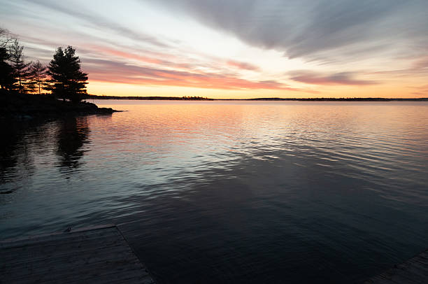 istock Sunrise over a beautiful Canadian Lake 2222602356