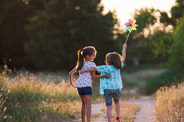 istock Joyful Friendship on a Sunny Pathway 2222603812