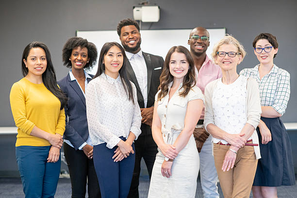 istock Diverse Group of Professionals Posing Together in a Modern Office Setting 2222605427