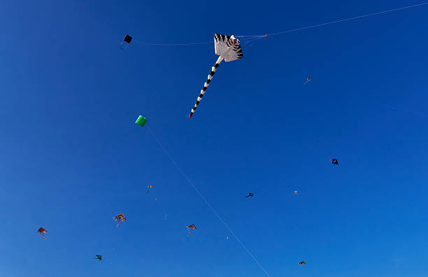 istock Blue sky decorated with kites in Cholula 2222606406