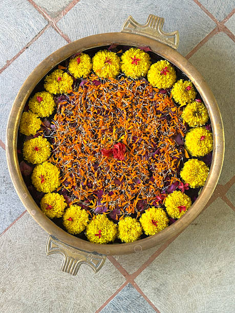 istock Marigold arrangement on tiled floor, India 2222606913