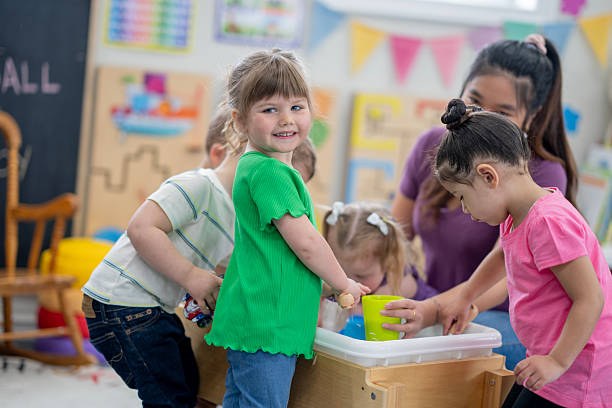 istock Happy Children Engaged in Hands-On Learning at a Preschool Classroom 2222608233