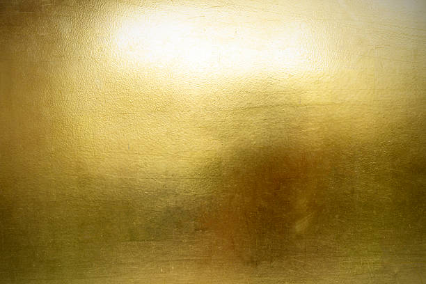Golden illuminated room with textured metallic finish.