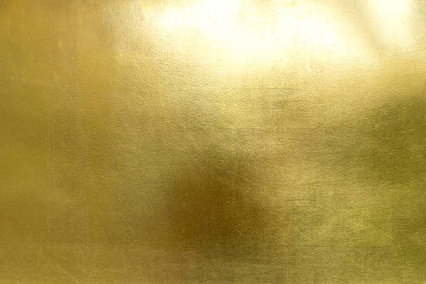 istock gold foil background with golden texture wall reflection 2222610010