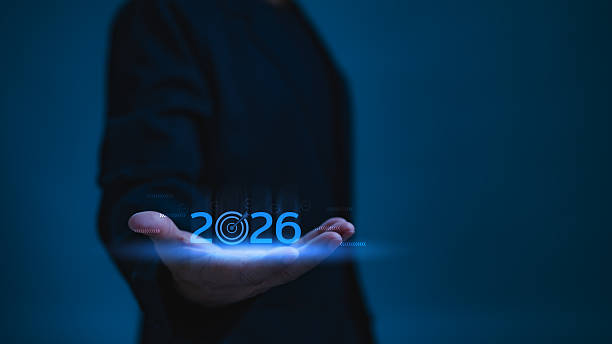 istock Futuristic Blue Hand Holds Glowing 2026 Target Network Strategy For Future Goals 2222610124