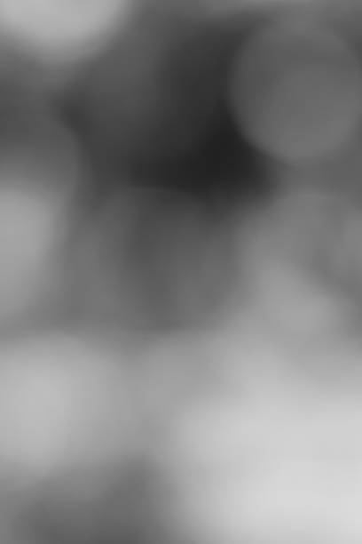 Abstract Monochrome Light and Shadow Play with Ethereal Bokeh Effects