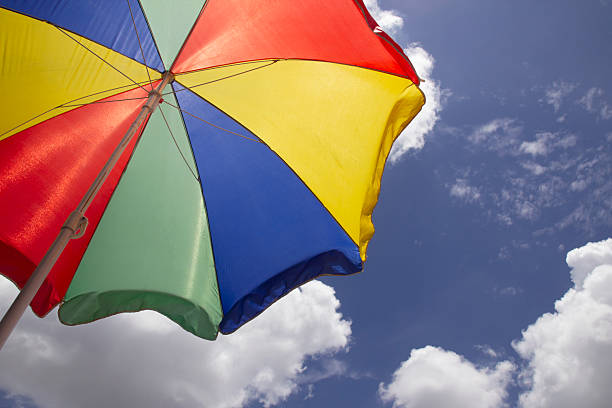 istock Beautiful umbrellas on the beach and sunny sky. 2222611125