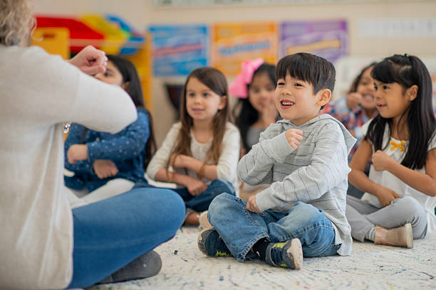 istock Preschool Classroom Activity With Children Engaged and Smiling 2222613324