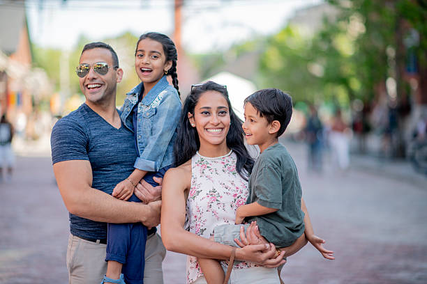 istock Happy Family Spending a Day Outdoors in a Vibrant Urban Environment 2222613672