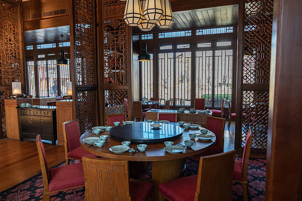 istock Elegant Traditional Chinese Restaurant Dining Room with Round Table 2222614091