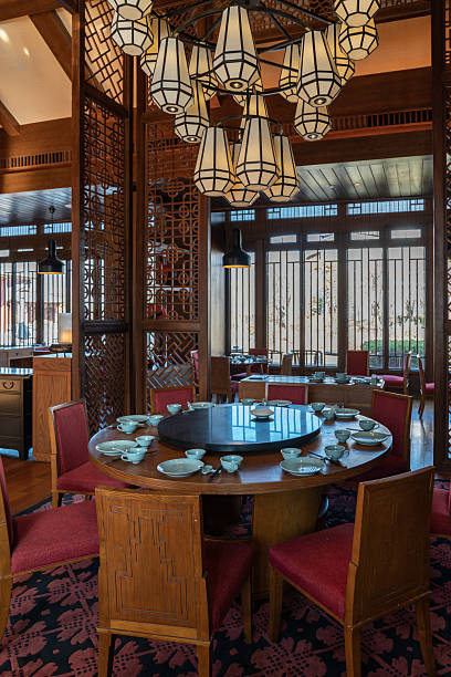 istock Elegant Traditional Chinese Restaurant Dining Room with Round Table 2222614094