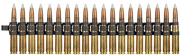 .50 BMG caliber ammunition belt with cartridges isolated on white.
