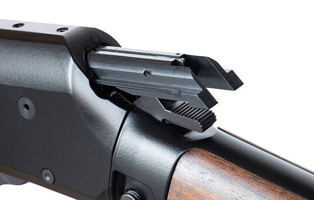 istock Bolt out and cocking the external hammer on a lever-action rifle 2222616965