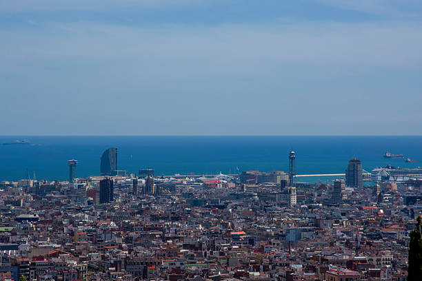 Barcelona Spain, high angle view city skyline. Clear view of the sea and buildings.